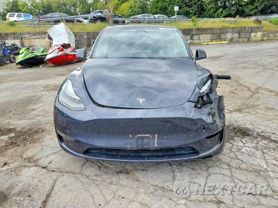 Piąte zdjęcie samochodu w środku: 2024 TESLA MODEL Y VIN:7SAYGDEE7RA222060 - miniatura