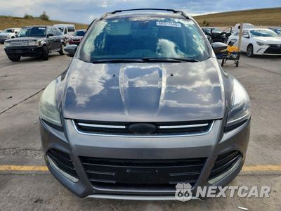 Piąte zdjęcie samochodu w środku: 2014 FORD ESCAPE TITANIUM VIN:1FMCU9J98EUC76103 - miniatura