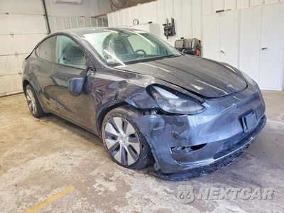 Czwarte zdjęcie samochodu z boku: 2024 TESLA MODEL Y VIN:7SAYGDEE4RA235624 - miniatura
