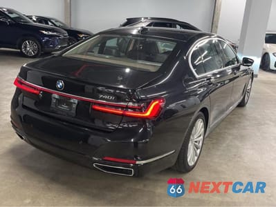 Czwarte zdjęcie samochodu z boku: 2022 BMW 740 I VIN:WBA7T2C00NCH24385 - miniatura
