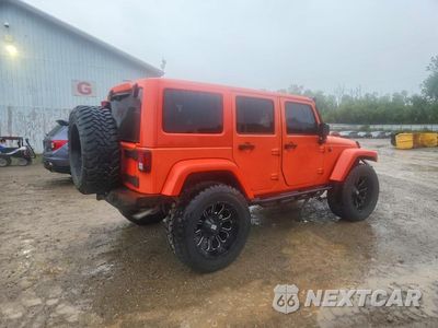 Trzecie zdjęcie samochodu z tyłu: 2015 JEEP WRANGLER UNLIMITED SAHARA VIN:1C4BJWEG7FL700197 - miniatura
