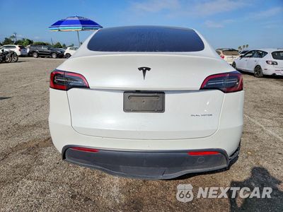 Zdjęcie 6 z 13 samochodu: 2024 TESLA MODEL Y VIN:7SAYGDEE8RF165323 - miniatura