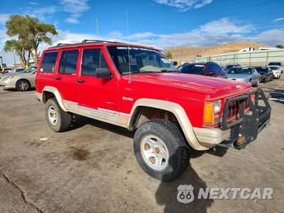 Czwarte zdjęcie samochodu z boku: 1993 JEEP CHEROKEE COUNTRY VIN:1J4FJ78S3PL575458 - miniatura