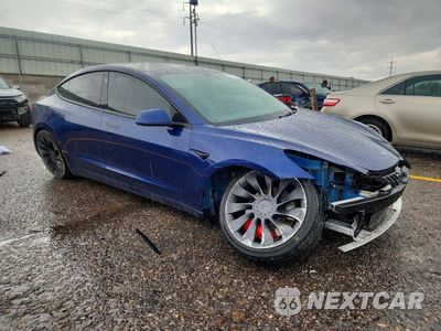 Czwarte zdjęcie samochodu z boku: 2023 TESLA MODEL 3 VIN:5YJ3E1EC3PF552143 - miniatura