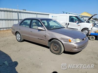 Czwarte zdjęcie samochodu z boku: 1999 TOYOTA COROLLA VE VIN:1NXBR12E4XZ286849 - miniatura