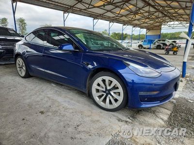 Czwarte zdjęcie samochodu z boku: 2022 TESLA MODEL 3 VIN:5YJ3E1EAXNF190890 - miniatura
