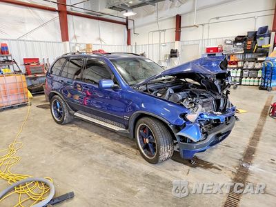 Czwarte zdjęcie samochodu z boku: 2004 BMW X5 4.8IS VIN:5UXFA93594LE81231 - miniatura