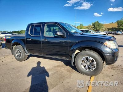 Czwarte zdjęcie samochodu z boku: 2019 NISSAN FRONTIER PRO-4X VIN:1N6AD0EV7KN705104 - miniatura