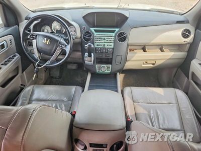 Zdjęcie 8 z 13 samochodu: 2011 HONDA PILOT TOURING VIN:5FNYF4H95BB081237 - miniatura