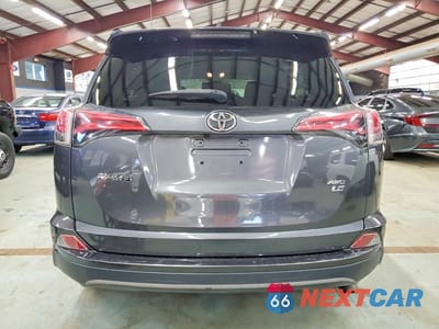 Zdjęcie 6 z 13 samochodu: 2018 TOYOTA RAV4 LE VIN:JTMBFREV4JJ737584 - miniatura