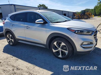 Czwarte zdjęcie samochodu z boku: 2017 HYUNDAI TUCSON LIMITED VIN:KM8J33A28HU460679 - miniatura