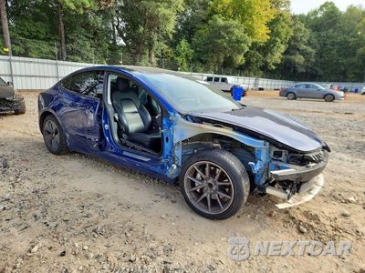 Czwarte zdjęcie samochodu z boku: 2020 TESLA MODEL 3 VIN:5YJ3E1EAXLF611794 - miniatura