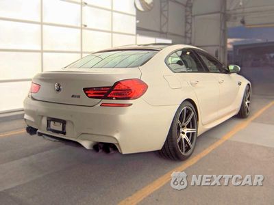 Czwarte zdjęcie samochodu z boku: 2014 BMW M6 GRAN COUPE VIN:WBS6C9C52ED466809 - miniatura