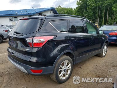 Trzecie zdjęcie samochodu z tyłu: 2018 FORD ESCAPE SE VIN:1FMCU9GD9JUB76128 - miniatura