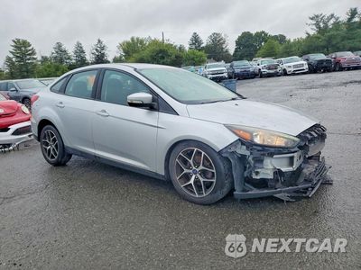Czwarte zdjęcie samochodu z boku: 2017 FORD FOCUS SEL VIN:1FADP3H27HL312823 - miniatura