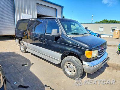 Czwarte zdjęcie samochodu z boku: 2007 FORD ECONOLINE E150 WAGON VIN:1FMNE11LX7DA70142 - miniatura