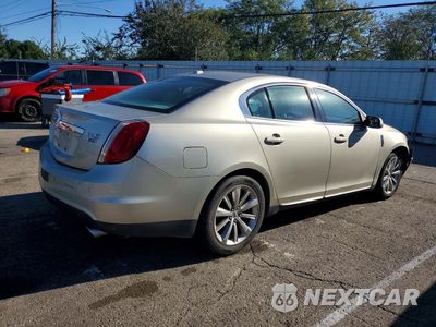 Trzecie zdjęcie samochodu z tyłu: 2011 LINCOLN MKS VIN:1LNHL9ERXBG606742 - miniatura
