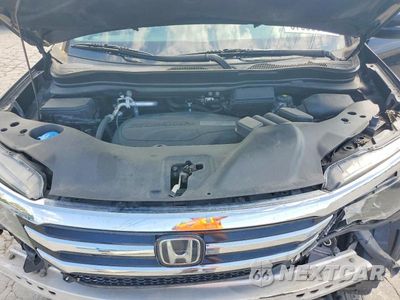 Zdjęcie 12 z 14 samochodu: 2016 HONDA PILOT ELITE VIN:5FNYF6H01GB102816 - miniatura