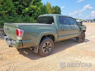 Trzecie zdjęcie samochodu z tyłu: 2021 TOYOTA TACOMA TRD SPORT VIN:3TMCZ5AN5MM449722 - miniatura