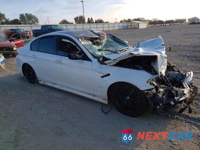 Czwarte zdjęcie samochodu z boku: 2018 BMW M5 VIN:WBSJF0C53JB283924 - miniatura