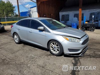 Czwarte zdjęcie samochodu z boku: 2016 FORD FOCUS SE VIN:1FADP3F21GL382948 - miniatura