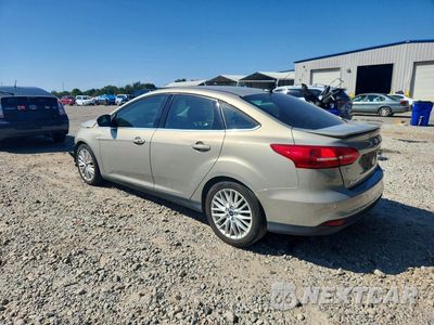 Drugie zdjęcie samochodu z przodu: 2015 FORD FOCUS TITANIUM VIN:1FADP3J25FL259143 - miniatura