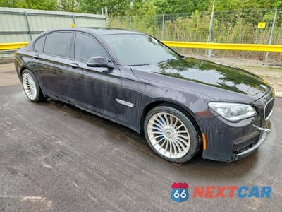 Czwarte zdjęcie samochodu z boku: 2015 BMW 750 LXI VIN:WBAYF8C57FD653950 - miniatura