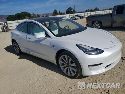 Czwarte zdjęcie samochodu z boku: 2020 TESLA MODEL 3 VIN:5YJ3E1EB4LF640474 - miniatura