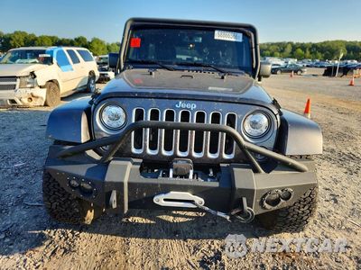 Piąte zdjęcie samochodu w środku: 2017 JEEP WRANGLER UNLIMITED SAHARA VIN:1C4BJWEG2HL619451 - miniatura