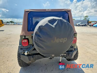 Zdjęcie 6 z 12 samochodu: 1998 JEEP WRANGLER / TJ SAHARA VIN:1J4FY49S6WP730696 - miniatura