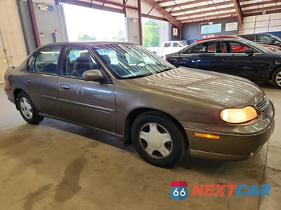 Czwarte zdjęcie samochodu z boku: 2001 CHEVROLET MALIBU LS VIN:1G1NE52J11M684103 - miniatura