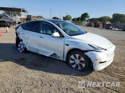 Czwarte zdjęcie samochodu z boku: 2023 TESLA MODEL Y VIN:7SAYGDEE4PA088752 - miniatura