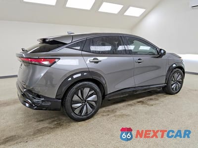 Trzecie zdjęcie samochodu z tyłu: 2025 NISSAN ARIYA EVOLVE+ E-4ORCE VIN:JN8DF0BF4SM764760 - miniatura