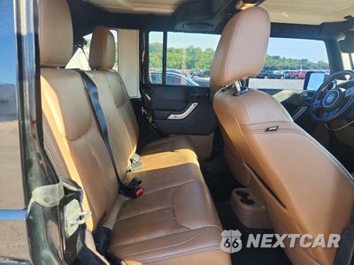 Zdjęcie 10 z 12 samochodu: 2014 JEEP WRANGLER UNLIMITED SAHARA VIN:1C4HJWEG6EL109741 - miniatura