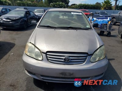 Piąte zdjęcie samochodu w środku: 2003 TOYOTA COROLLA LE VIN:1NXBR32E33Z010832 - miniatura