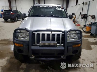 Piąte zdjęcie samochodu w środku: 2003 JEEP LIBERTY SPORT VIN:1J4GL48K73W722225 - miniatura