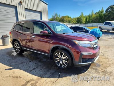Czwarte zdjęcie samochodu z boku: 2019 HONDA PILOT ELITE VIN:5FNYF6H02KB036544 - miniatura