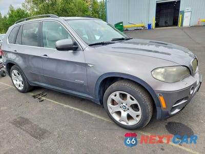 Czwarte zdjęcie samochodu z boku: 2011 BMW X5 XDRIVE50I VIN:5UXZV8C5XBL421531 - miniatura
