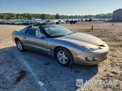 Czwarte zdjęcie samochodu z boku: 1999 PONTIAC FIREBIRD VIN:2G2FS22K2X2222695 - miniatura