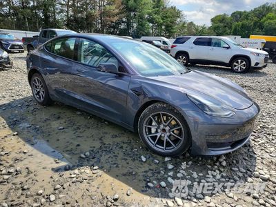 Czwarte zdjęcie samochodu z boku: 2023 TESLA MODEL 3 VIN:5YJ3E1EA8PF701211 - miniatura