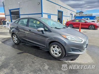 Czwarte zdjęcie samochodu z boku: 2015 FORD FIESTA SE VIN:3FADP4BJXFM141745 - miniatura