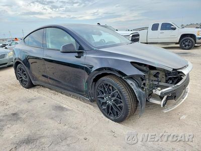 Czwarte zdjęcie samochodu z boku: 2023 TESLA MODEL Y VIN:7SAYGDEE5PA051807 - miniatura