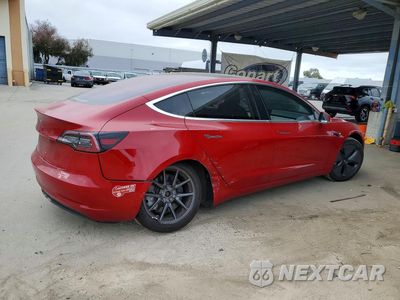 Trzecie zdjęcie samochodu z tyłu: 2018 TESLA MODEL 3 VIN:5YJ3E1EA0JF016739 - miniatura