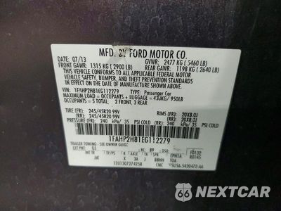 Zdjęcie 12 z 12 samochodu: 2014 FORD TAURUS SEL VIN:1FAHP2H81EG112279 - miniatura