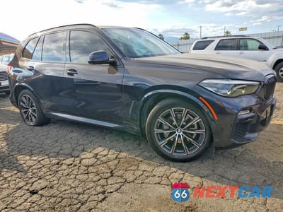 Czwarte zdjęcie samochodu z boku: 2019 BMW X5 XDRIVE40I VIN:5UXCR6C52KLL03892 - miniatura