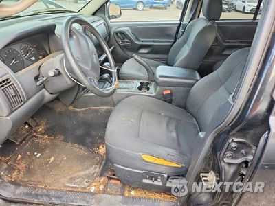 Zdjęcie 7 z 13 samochodu: 2004 JEEP GRAND CHEROKEE LAREDO VIN:1J4GW48S44C189051 - miniatura