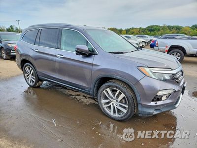Czwarte zdjęcie samochodu z boku: 2017 HONDA PILOT TOURING VIN:5FNYF6H91HB075942 - miniatura