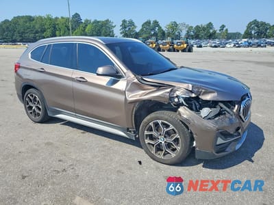 Czwarte zdjęcie samochodu z boku: 2020 BMW X1 XDRIVE28I VIN:WBXJG9C06L5P15035 - miniatura