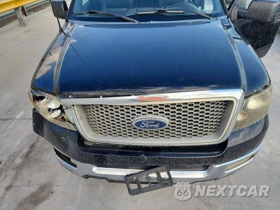 Zdjęcie 11 z 12 samochodu: 2005 FORD F150 VIN:1FTPX12515KD49530 - miniatura
