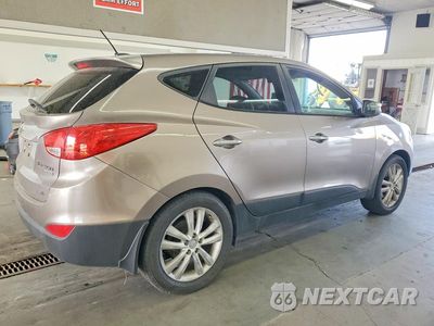 Trzecie zdjęcie samochodu z tyłu: 2011 HYUNDAI TUCSON LIMITED VIN:KM8JUCAC6BU312656 - miniatura